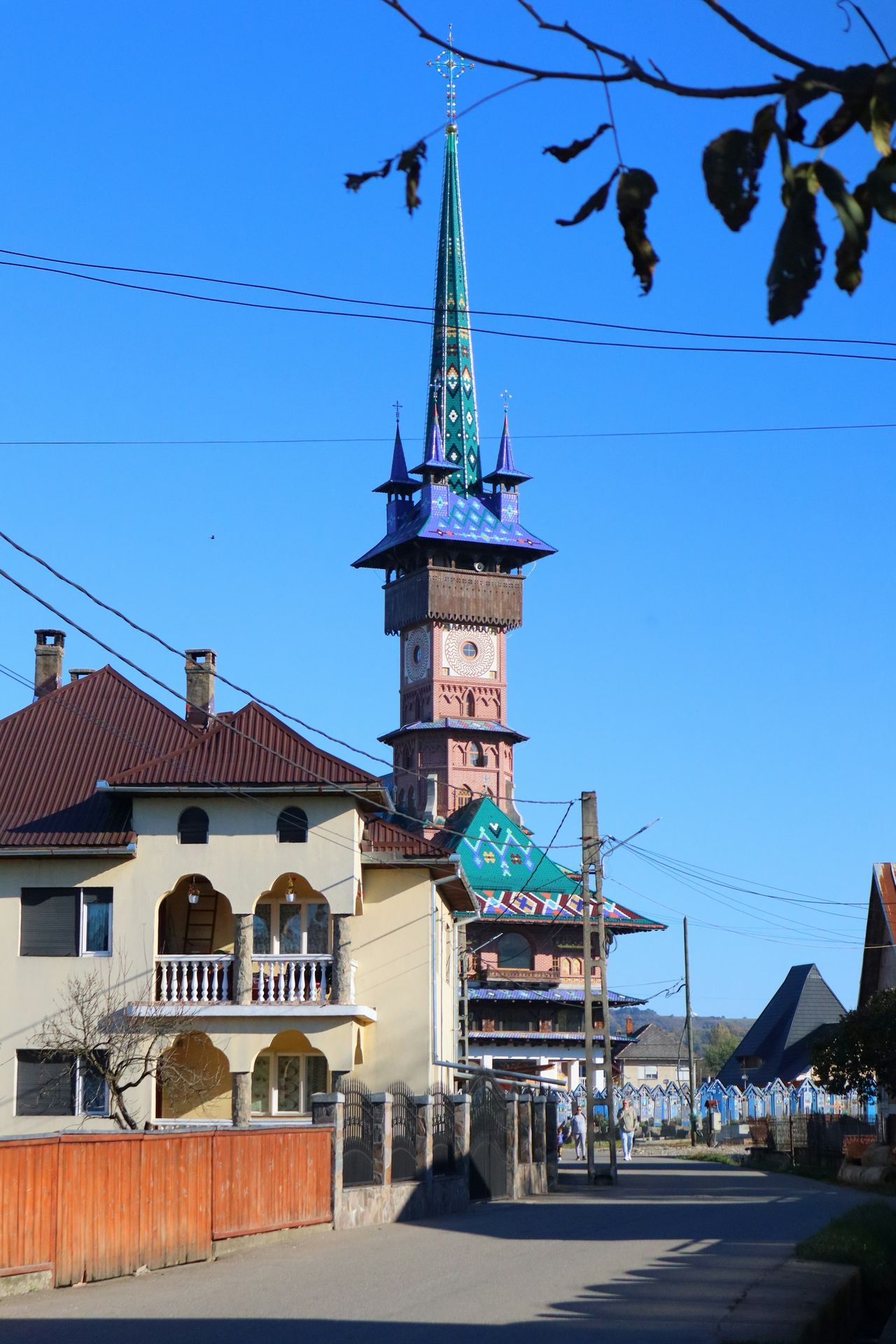 A tall tower with a clock on top of it